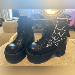 Webbed heeled demonia boots